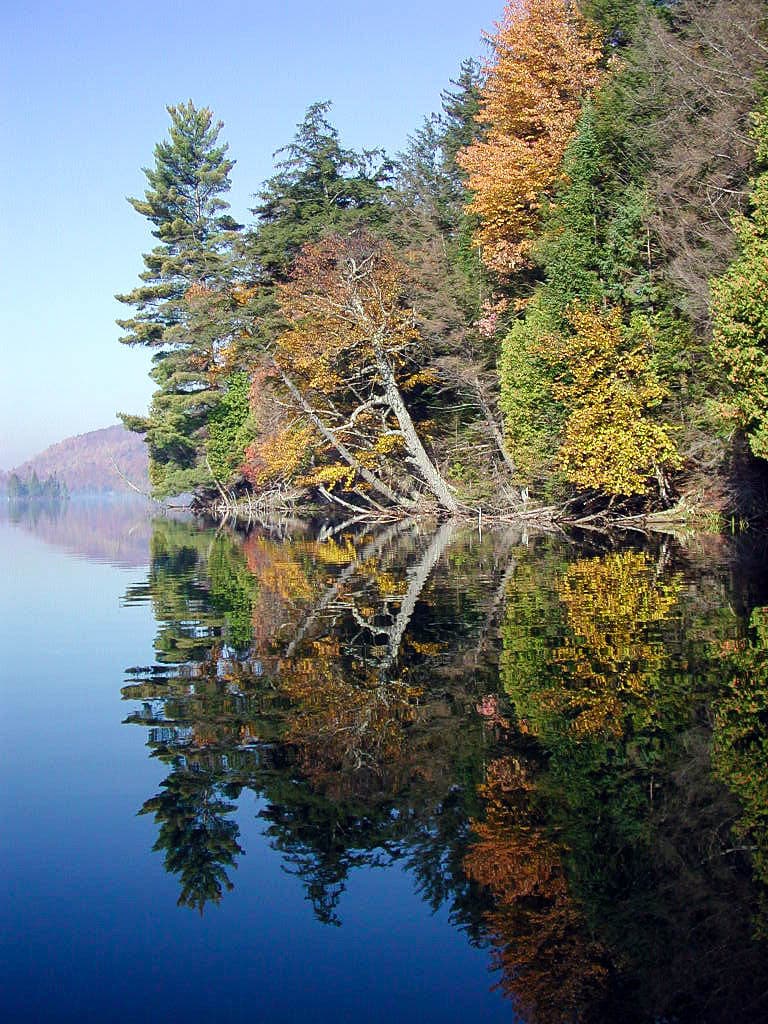 Autumn reflections on Lac Matabi, Laurentides